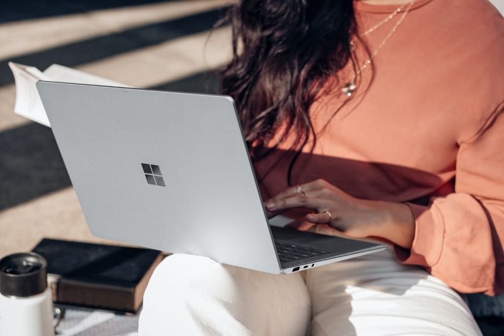 woman using a Windows laptop