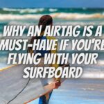 skis in the snow with a title that reads why an AirTag is a must-have if you're flying with your surfboard